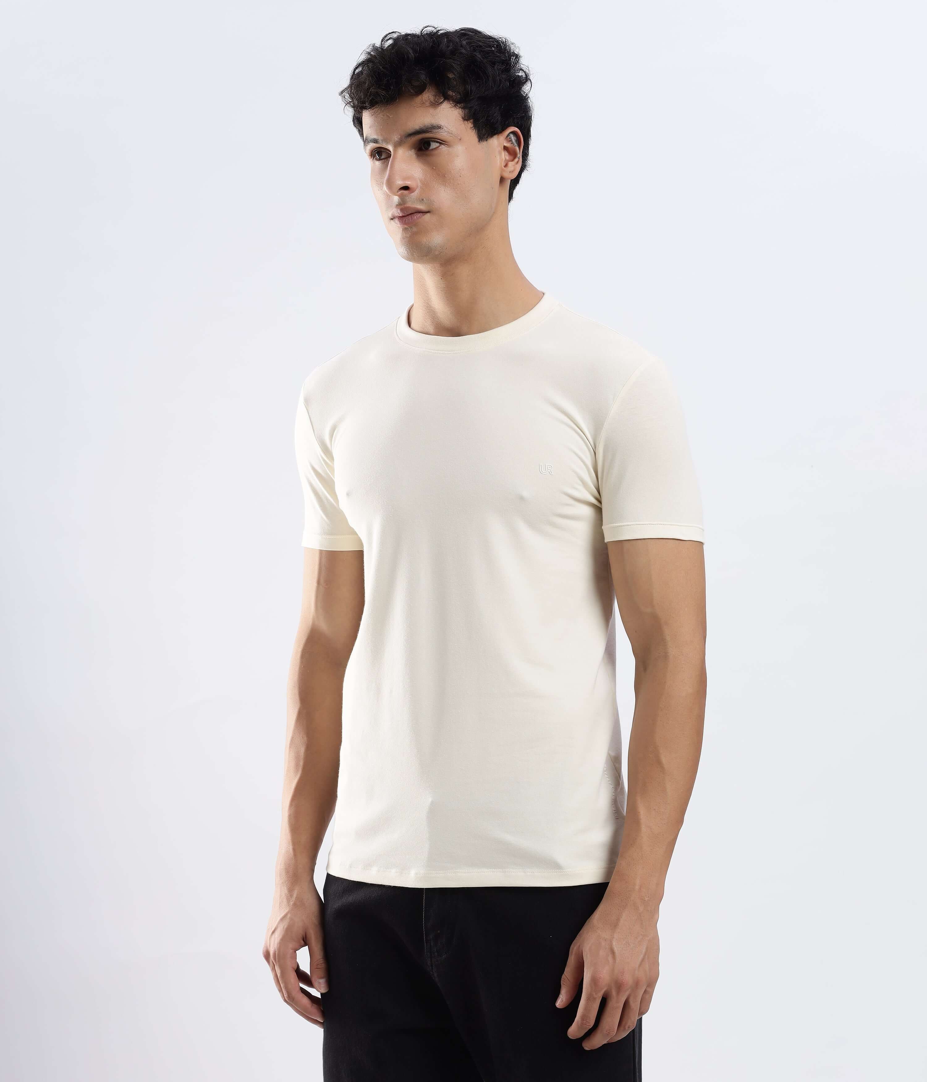 Model wearing Polar Off-white cotton tshirt, stretchable, waterproof, anti-odour, best tshirt for everyday wear.