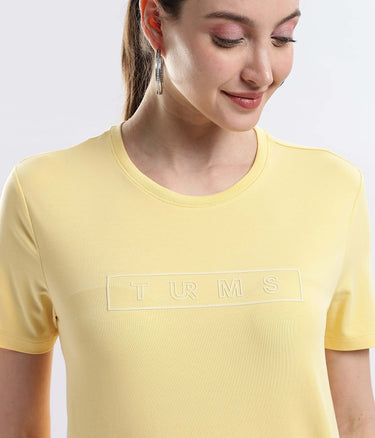 Womens casual t-shirt Aura Yellow cotton tshirt featuring a stylish logo design, stretchable, waterproof, and anti-odour properties.