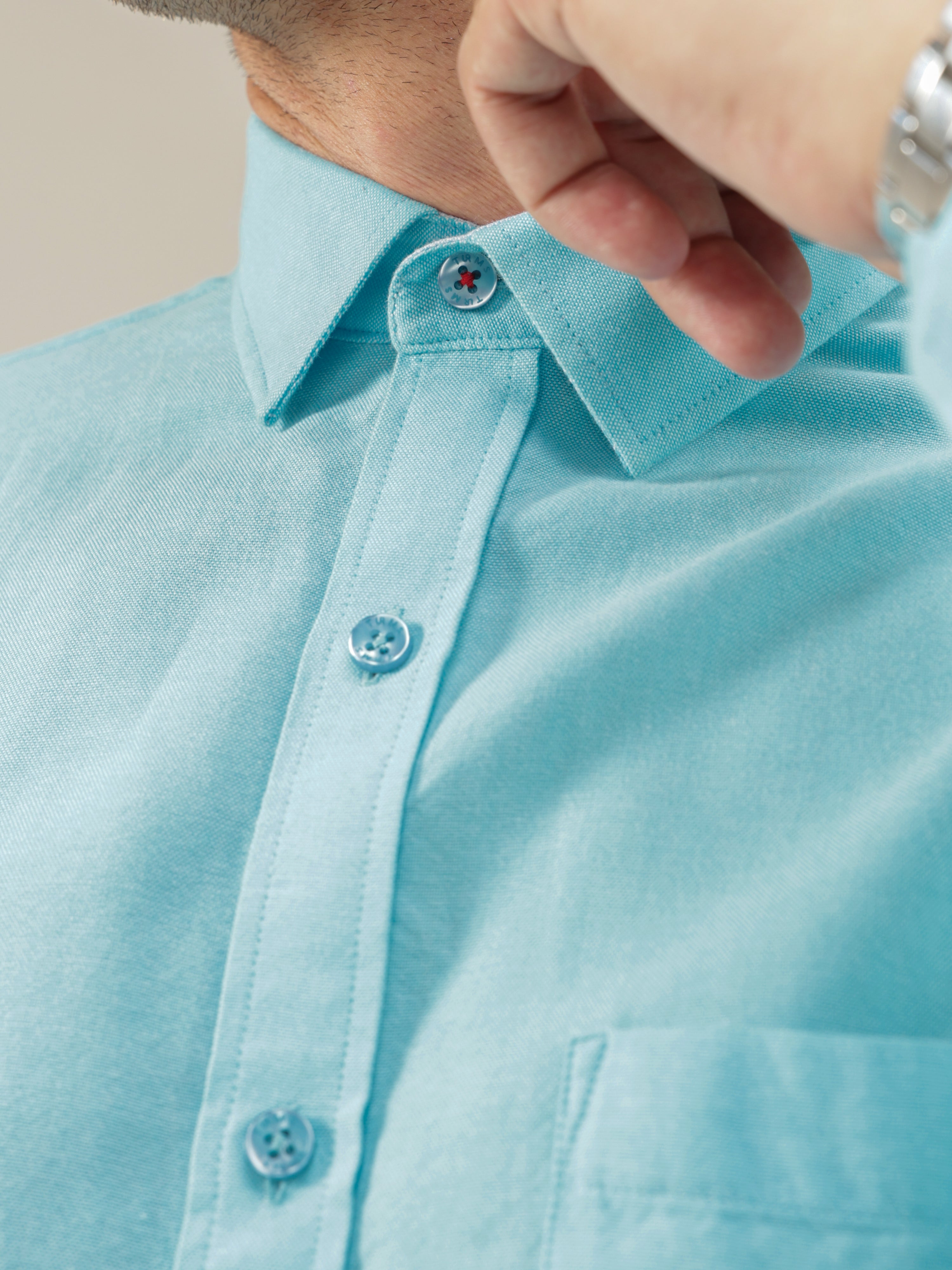 Turquoise Oasis men's shirt made of premium-grade super combed cotton, showcasing meticulous stitching and a crisp collar for stylish menswear.