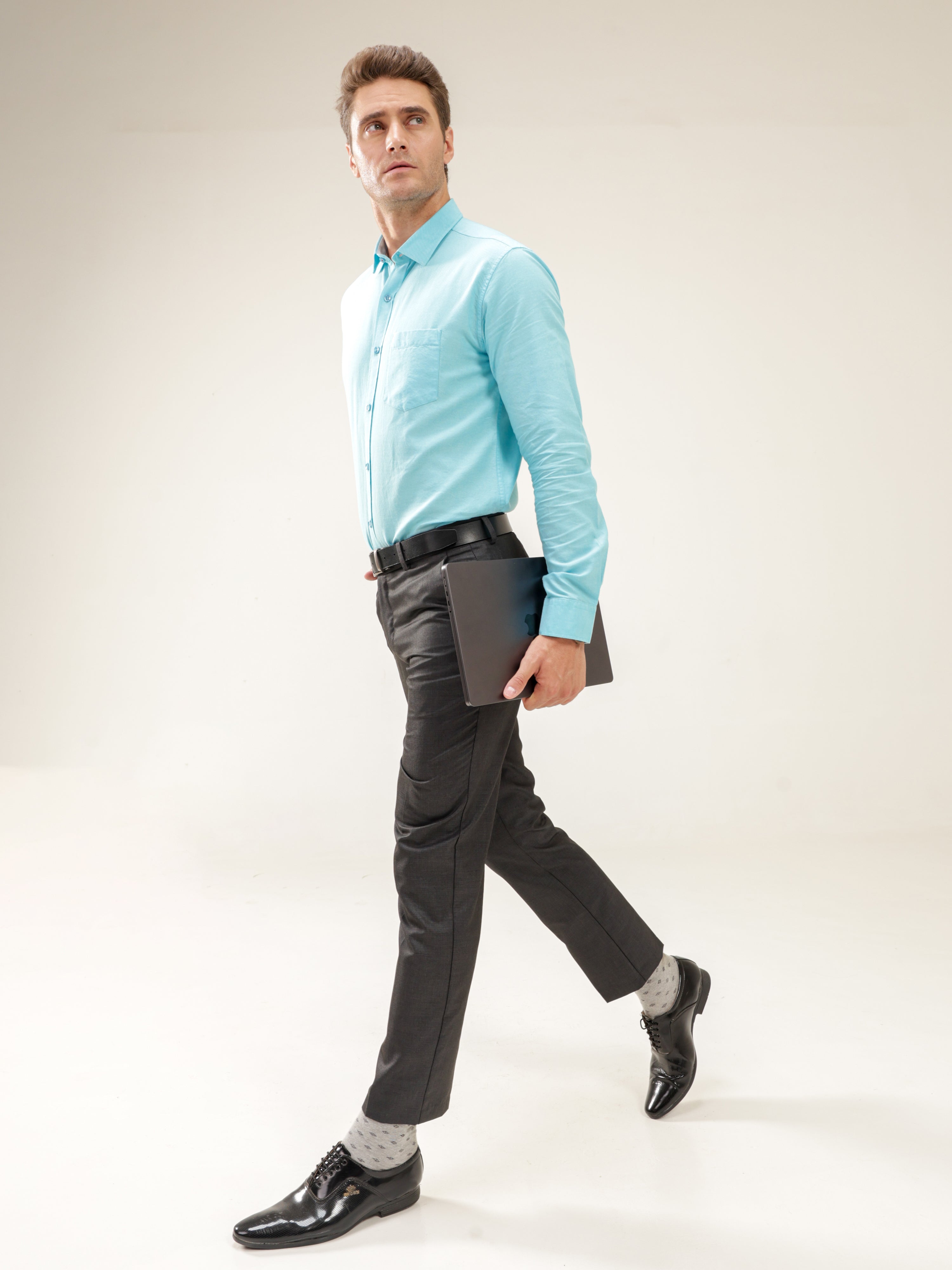Man wearing Turquoise Oasis Oxford Turms shirt, premium menswear, casual and office wear, stylish and water-resistant anti-stain shirt for men.