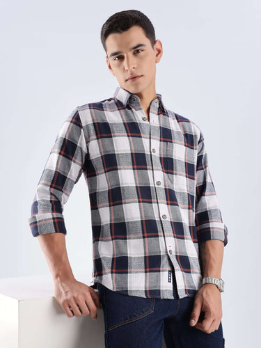 Model wearing a Blue Matrix Turms recycled cotton checked shirt showcasing style and sustainable fashion.