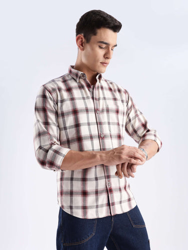 Man wearing a sustainable recycled cotton checked shirt, highlighting style and functionality with a cool tech feature.