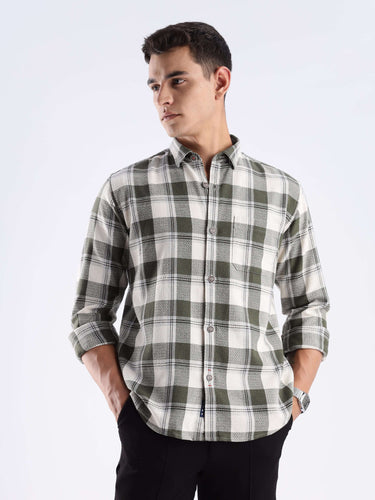 Model wearing the Mint Falls Turms recycled cotton checked shirt, showcasing sustainable fashion with a stylish design.