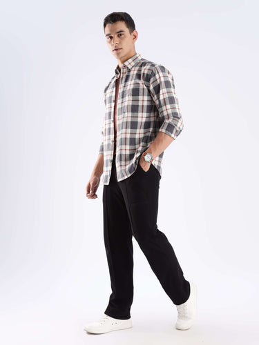 Model showcasing the Turms grey recycled cotton checked shirt with a stylish and modern look.