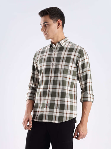 Model wearing the Meteor Green recycled cotton checked shirt, showcasing style and sustainable fashion.