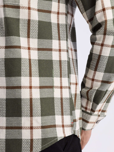 Close-up of the Meteor Green recycled cotton checked shirt showcasing its durable weave and stylish design.