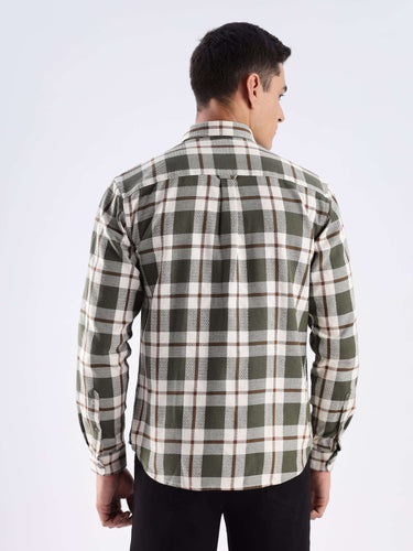 Back view of a man wearing the Meteor Green recycled cotton checked shirt, showcasing its sustainable design and quality craftsmanship.
